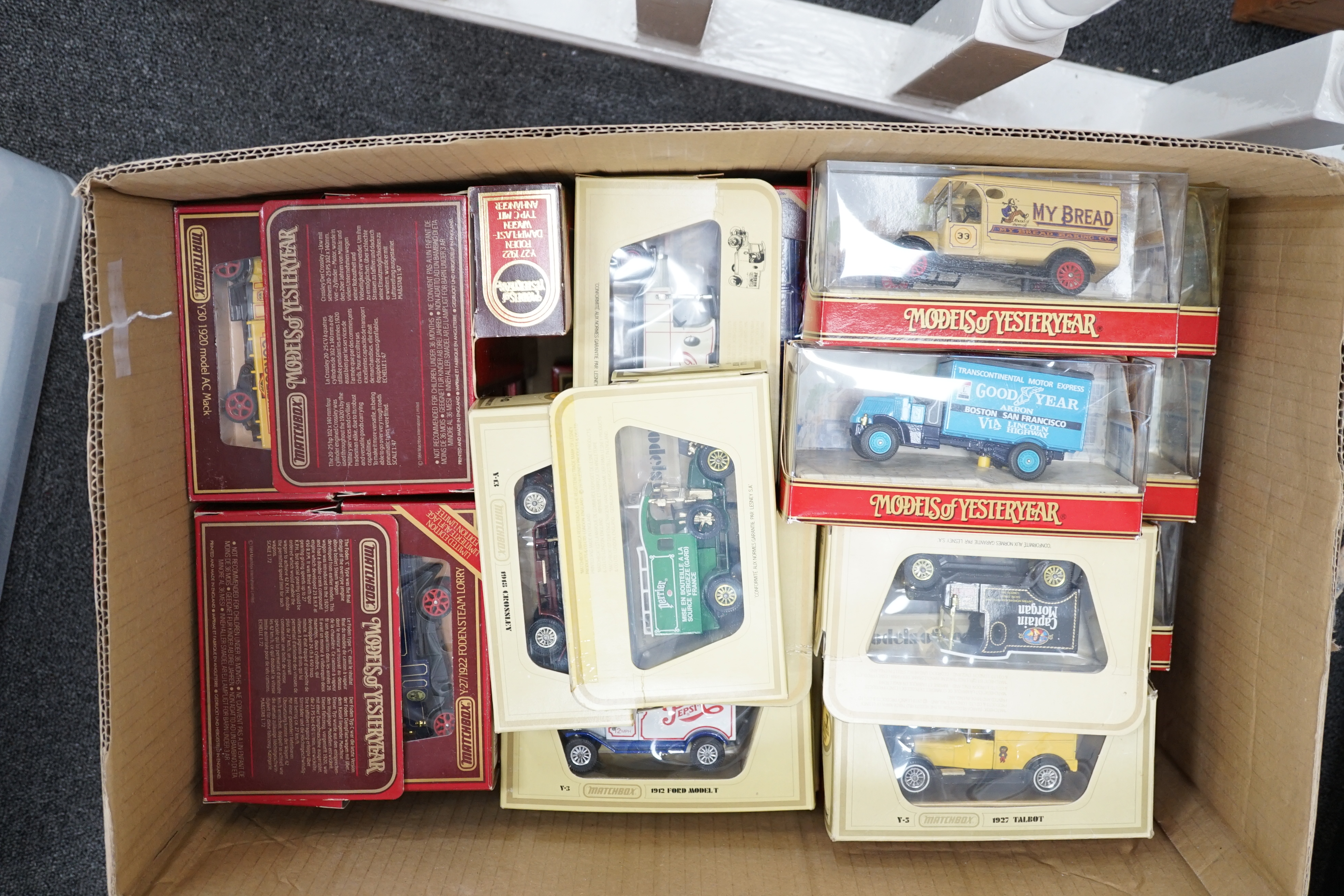 Sixty-six Matchbox Models of Yesteryear, in cream or maroon era boxes, including cars, commercial vehicles, fire engines, a Stephenson’s Rocket, etc.